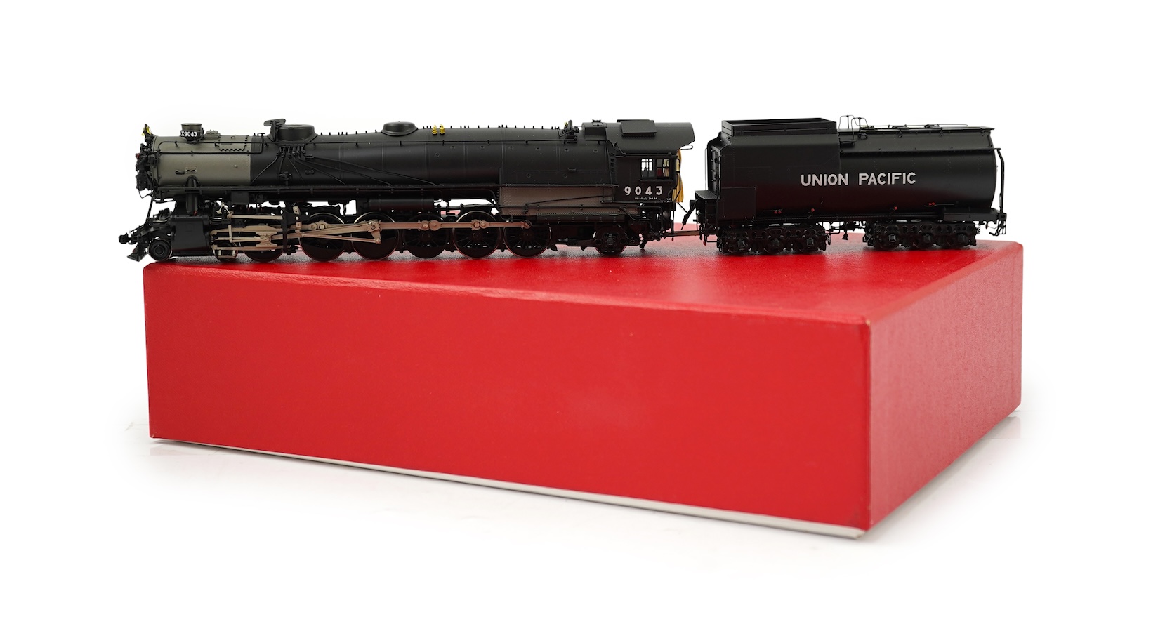 A boxed HO gauge Key Imports model of Union Pacific 9000 class, 9043, 4-12-2 tender locomotive, powered for two rail operation.